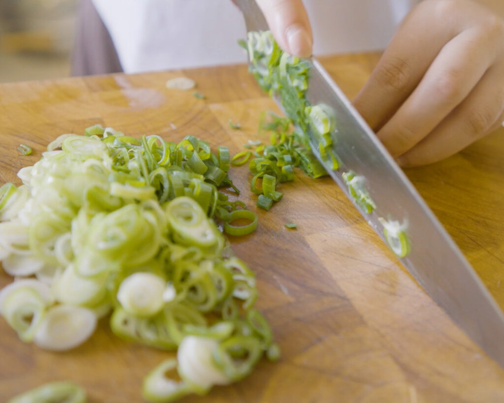 thinly slice spring onions